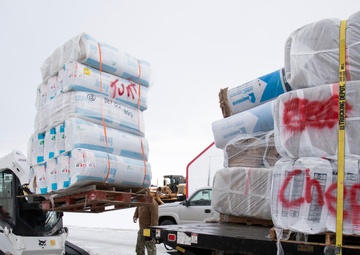 AKOM members distribute building supplies during Operation Halong Response