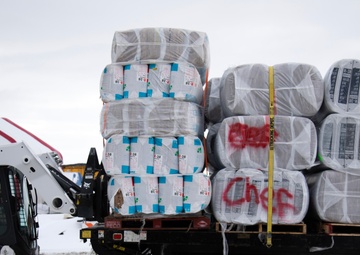 AKOM members distribute building supplies during Operation Halong Response