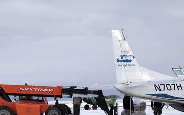 AKOM members distribute building supplies during Operation Halong Response