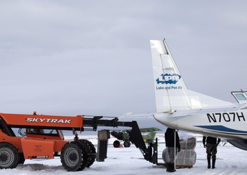 AKOM members distribute building supplies during Operation Halong Response