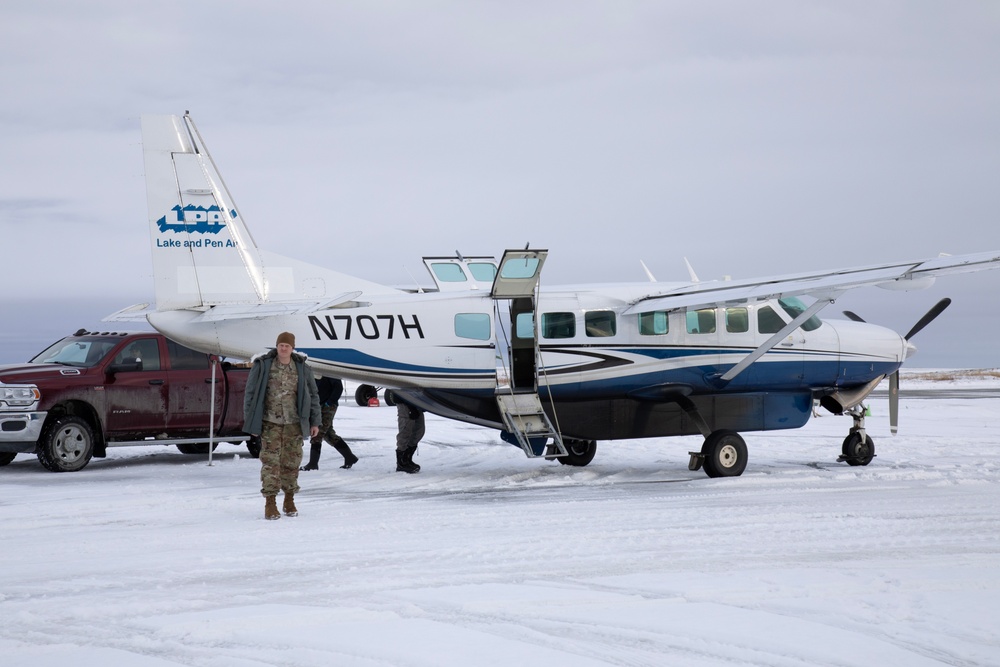 AKOM members distribute building supplies during Operation Halong Response