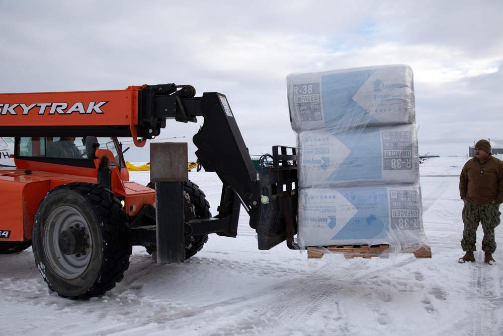 AKOM members distribute building supplies during Operation Halong Response