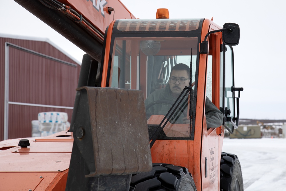 AKOM members distribute building supplies during Operation Halong Response