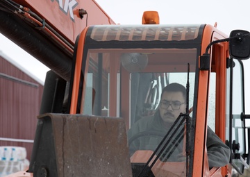 AKOM members distribute building supplies during Operation Halong Response