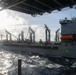 USS Iwo Jima Conducts a Replenishment-At-Sea with USNS Patuxent