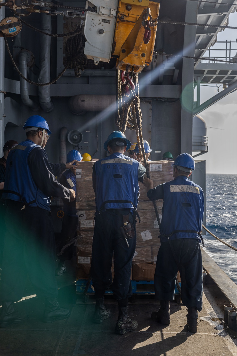 USS Iwo Jima Conducts a Replenishment-At-Sea with USNS Patuxent