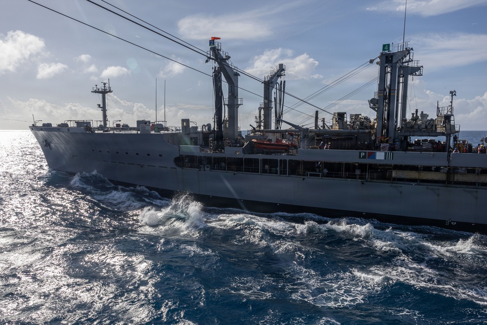 USS Iwo Jima Conducts a Replenishment-At-Sea with USNS Patuxent