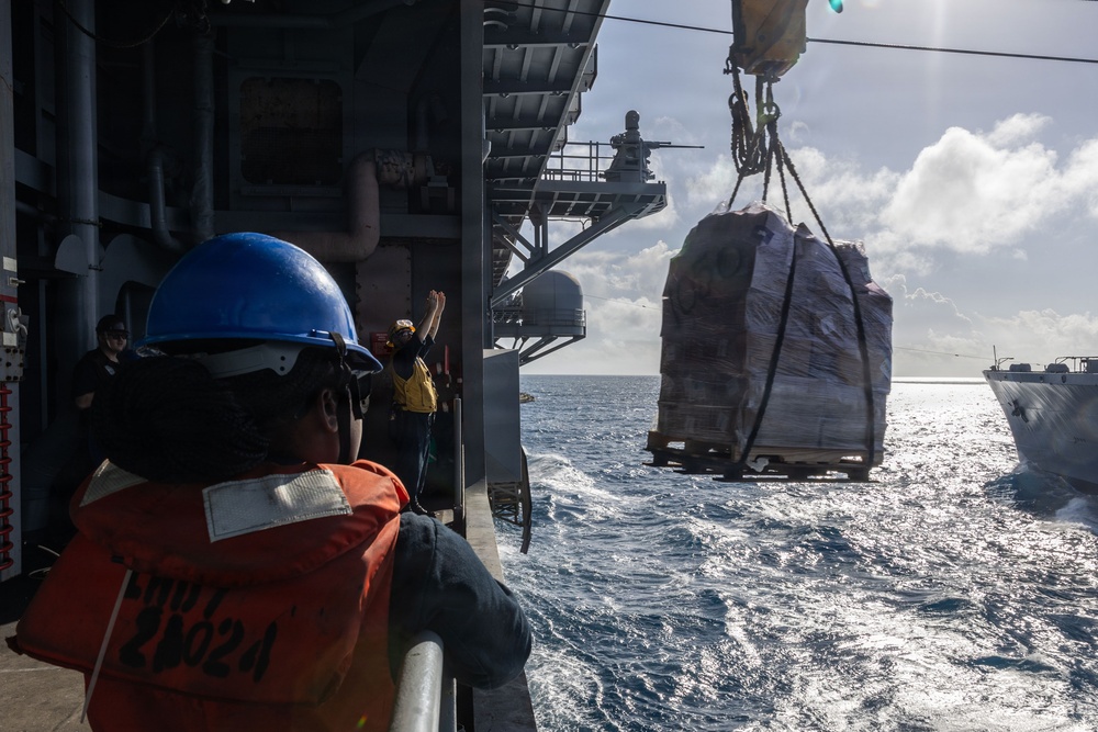 USS Iwo Jima Conducts a Replenishment-At-Sea with USNS Patuxent