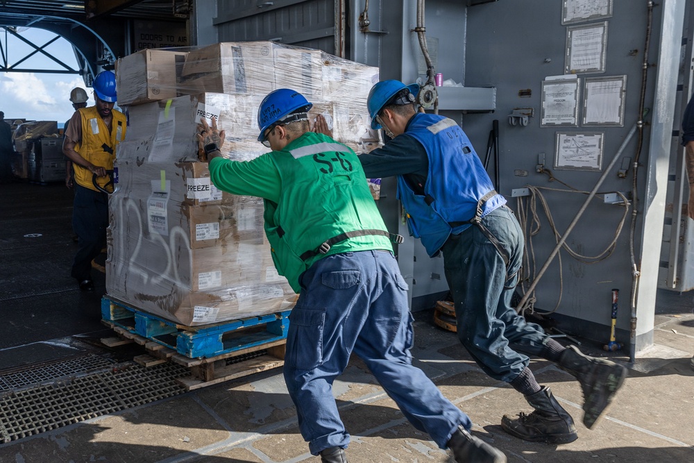 USS Iwo Jima Conducts a Replenishment-At-Sea with USNS Patuxent