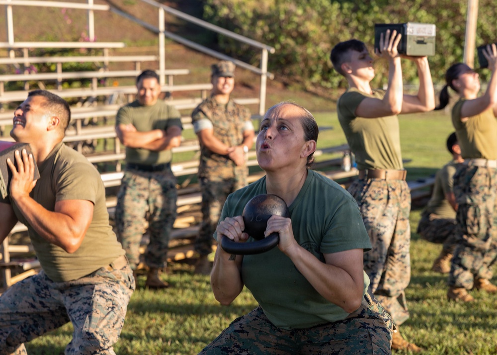 HQSVCBN MARFORPAC conducts physical training and cake cutting ceremony
