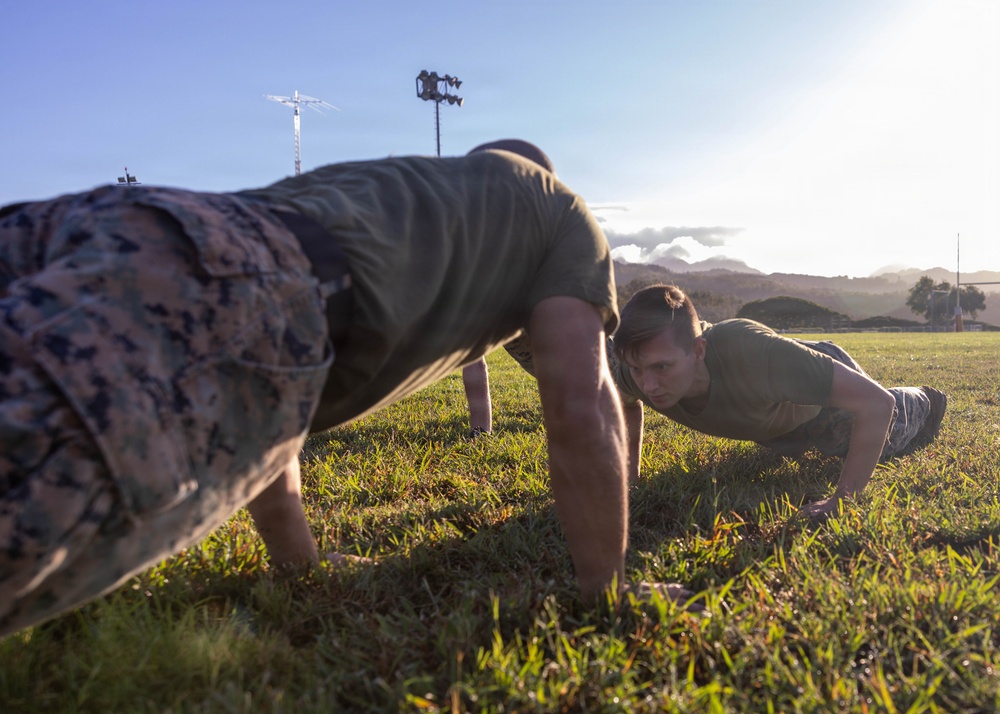 HQSVCBN MARFORPAC conducts physical training and cake cutting ceremony
