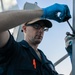 USS Mitscher (DDG 57) Sailor conducts maintenance on NULKA launching system