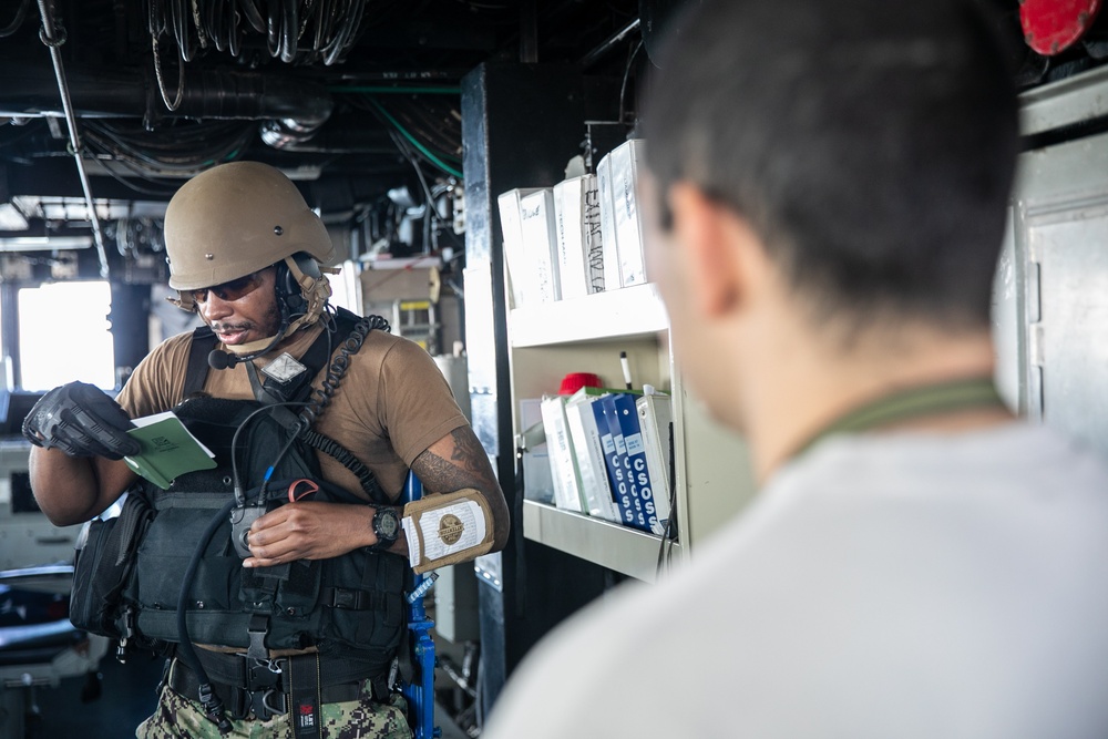 USS Mitscher (DDG 57) Sailor conducts VBSS exercise