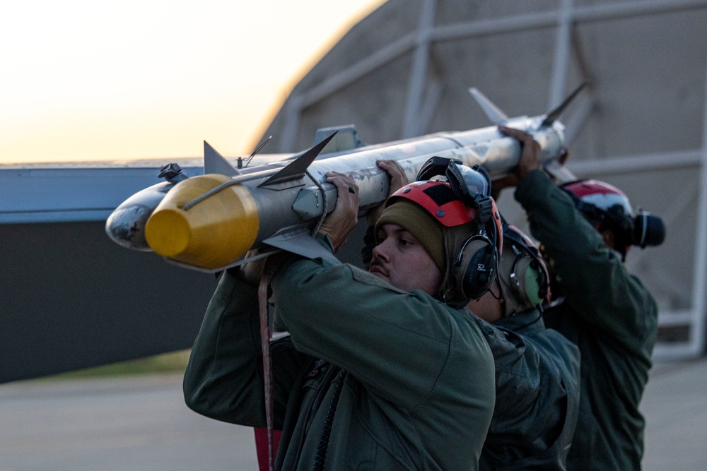 U.S. Marines with VMFA 232 load up ordnance