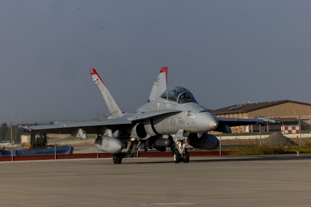 U.S. Marines with VMFA 232 load up ordnance