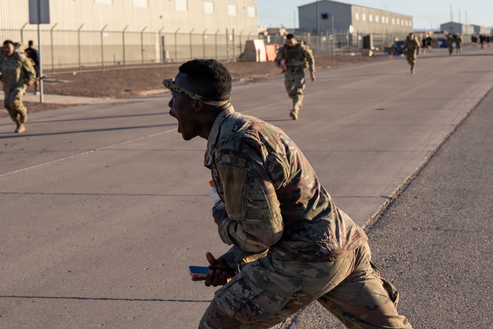1AD Soldiers compete in 12-mile ruck march during Iron Heroes 2025