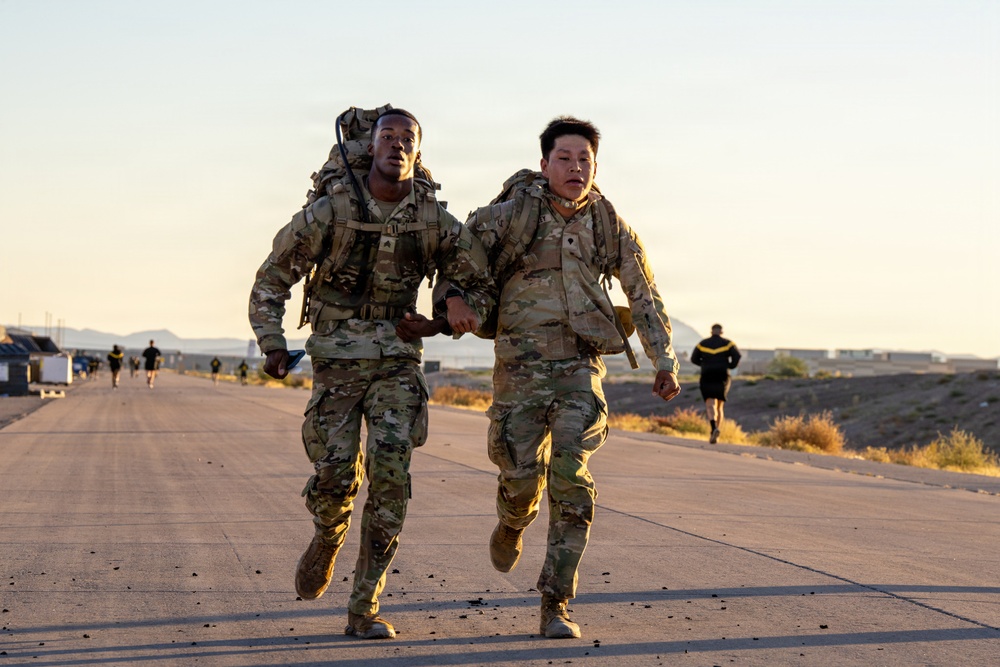 1AD Soldiers compete in 12-mile ruck march during Iron Heroes 2025