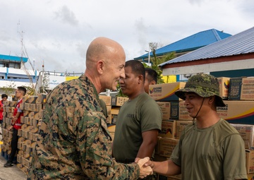Philippine SecDef Teodoro, US Ambassador Carlson Visit Service Members During Foreign Disaster Relief Operations