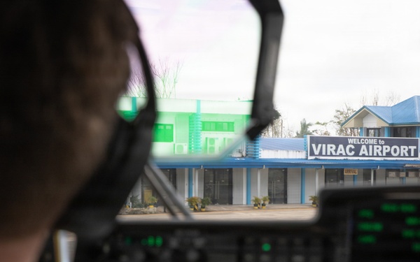 Philippine Service Members, US Marines Offload Disaster Relief Supplies in Virac, Philippines