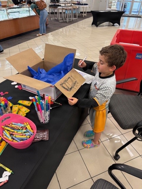 NEX patrons honor deployed loved ones with Hearts from Home care packages