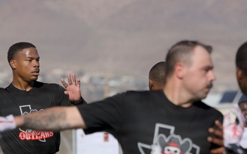 Fort Bliss Soldiers trade ranges for rushes during inaguaral MWR Turkey Bowl