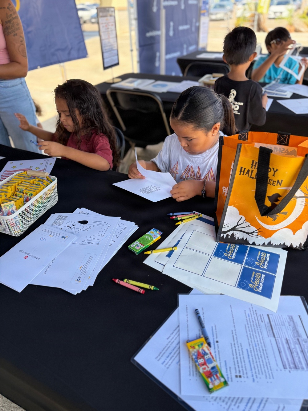 NEX patrons honor deployed loved ones with Hearts from Home care packages