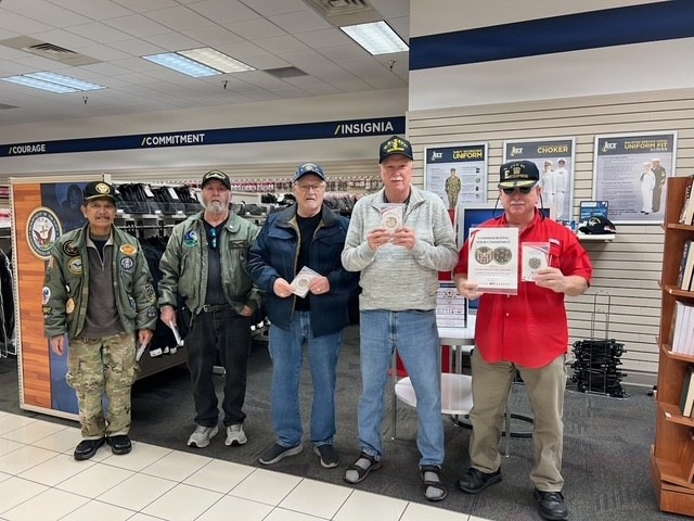 Veterans honored with a commemorative coin from the NEX