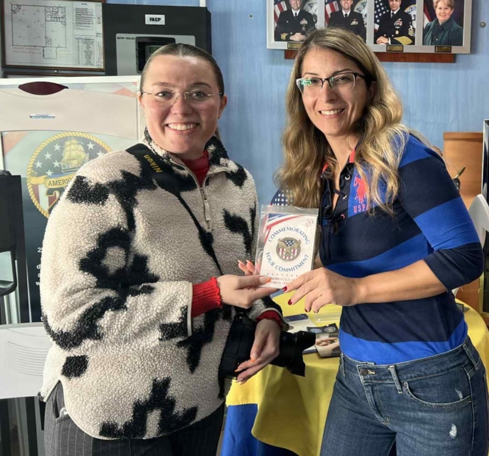 Veterans honored with a commemorative coin from the NEX