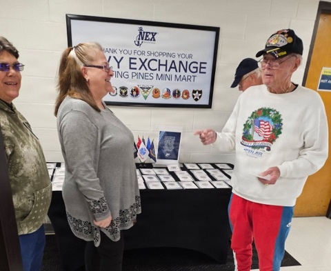 Veterans honored with a commemorative coin from the NEX