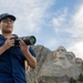 U.S. Coast Guard assets fly over Mount Rushmore National Memorial