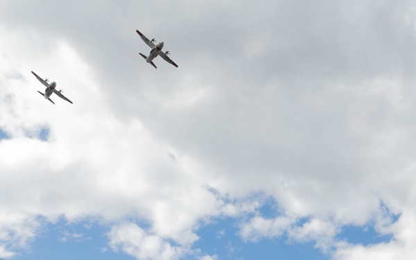 U.S. Coast Guard assets fly over Mount Rushmore National Memorial