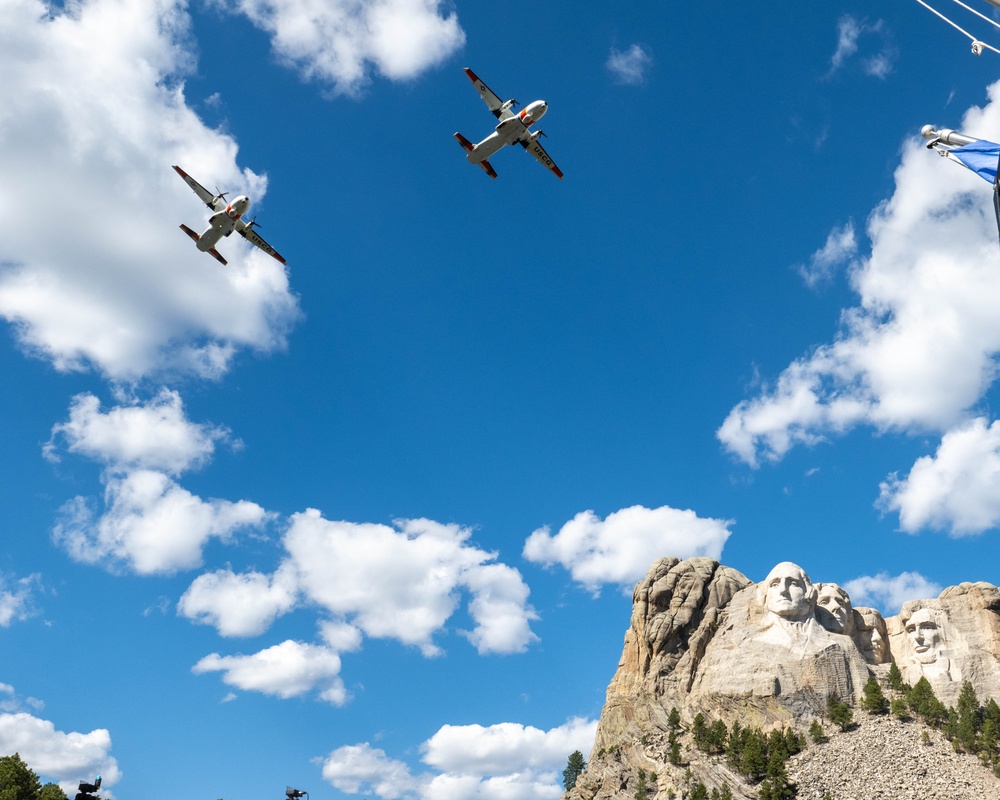 U.S. Coast Guard assets fly over Mount Rushmore National Memorial