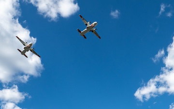 U.S. Coast Guard assets fly over Mount Rushmore National Memorial