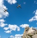 U.S. Coast Guard assets fly over Mount Rushmore National Memorial