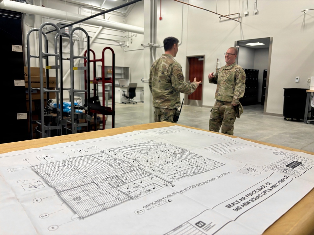 Airmen Review Plans Inside New Squadron Ops &amp; AMU Facility
