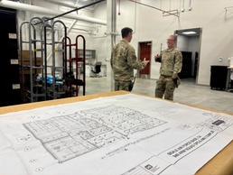 Airmen Review Plans Inside New Squadron Ops &amp; AMU Facility