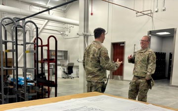 Airmen Review Plans Inside New Squadron Ops &amp; AMU Facility
