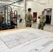 Airmen Review Plans Inside New Squadron Ops &amp; AMU Facility