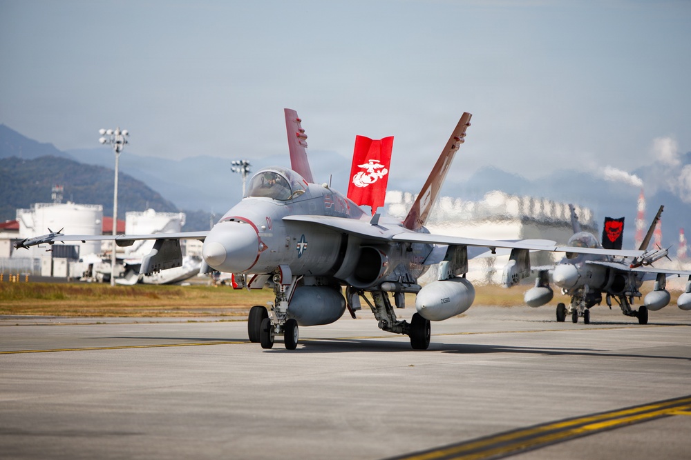 VMFA-232 and MALS-12 off-load live ordnance at MCAS Iwakuni