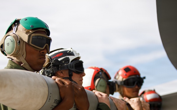 VMFA-232 and MALS-12 off-load live ordnance at MCAS Iwakuni