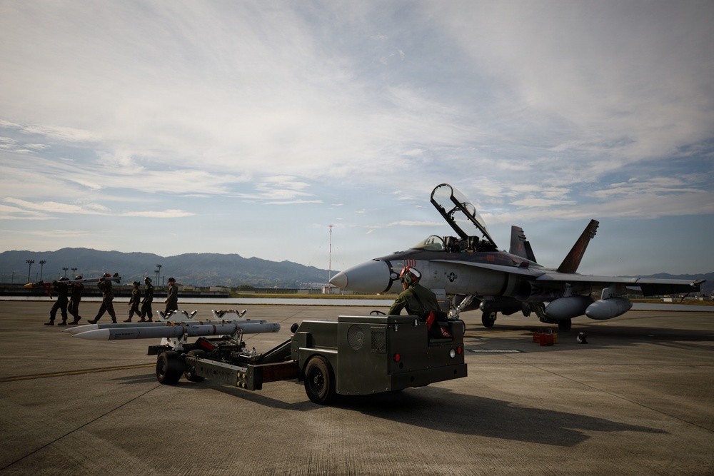 VMFA-232 and MALS-12 off-load live ordnance at MCAS Iwakuni