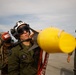 VMFA-232 and MALS-12 off-load live ordnance at MCAS Iwakuni