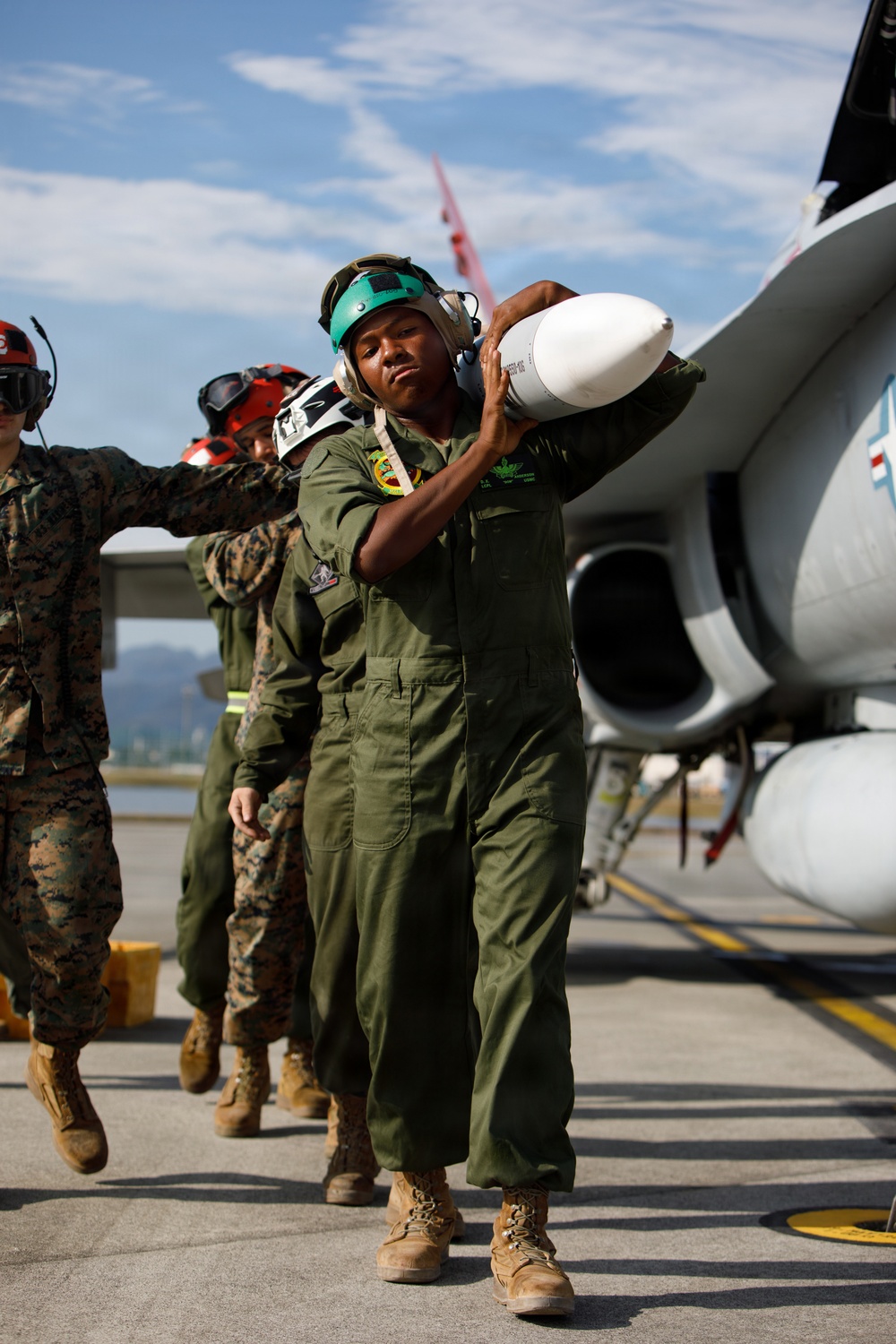 VMFA-232 and MALS-12 off-load live ordnance at MCAS Iwakuni