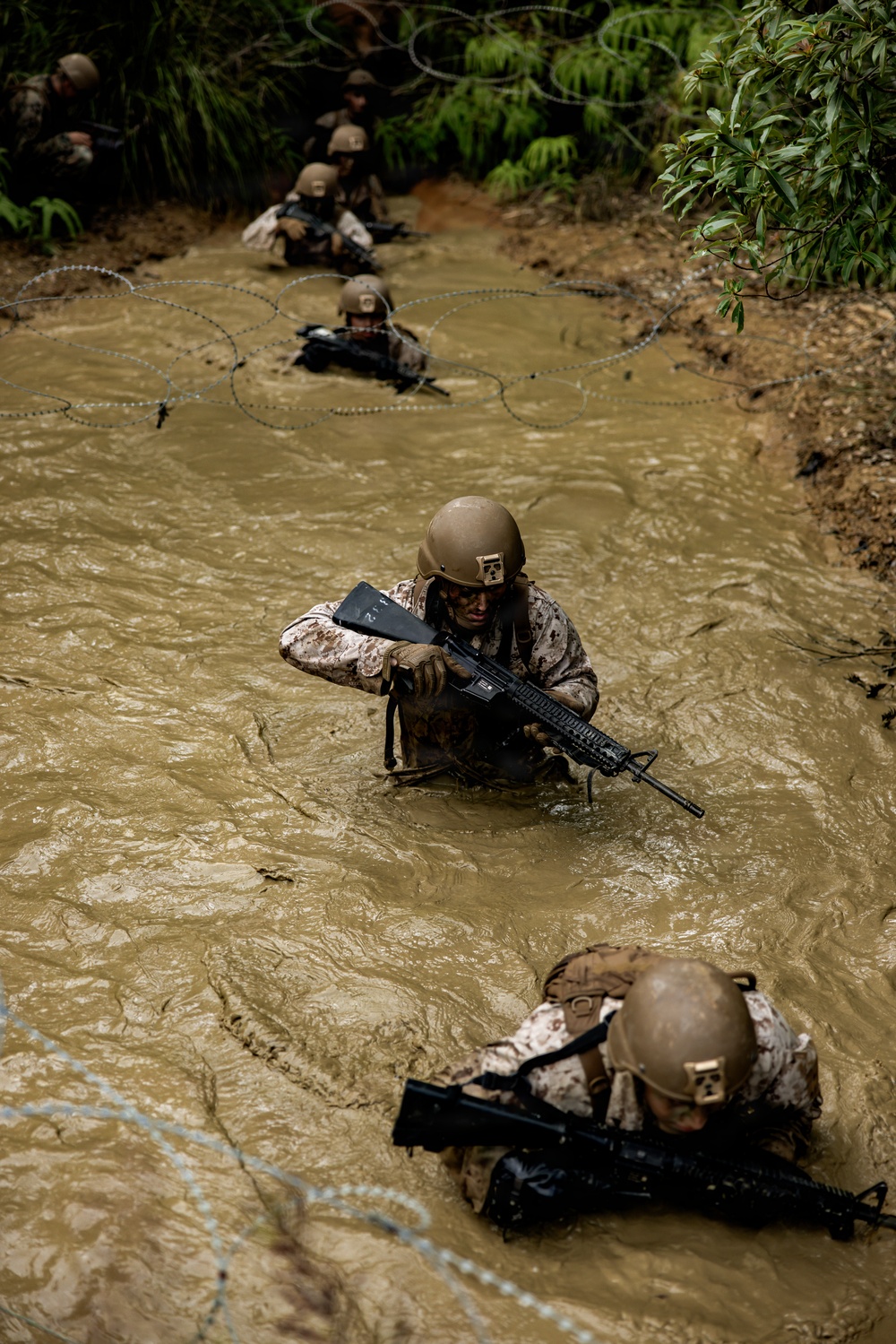 7th Communication Battalion Marines conduct jungle endurance obstacles at Jungle Warfare Training Center
