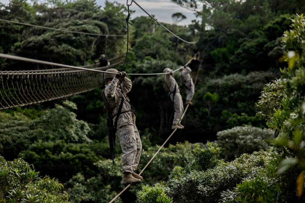 7th Communication Battalion Marines conduct jungle endurance obstacles at Jungle Warfare Training Center