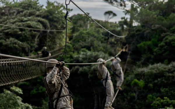 7th Communication Battalion Marines conduct jungle endurance obstacles at Jungle Warfare Training Center