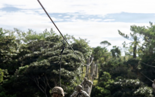 7th Communication Battalion Marines conduct jungle endurance obstacles at Jungle Warfare Training Center