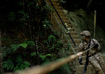 7th Communication Battalion Marines conduct jungle endurance obstacles at Jungle Warfare Training Center