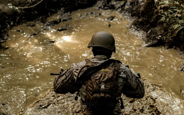 7th Communication Battalion Marines conduct jungle endurance obstacles at Jungle Warfare Training Center