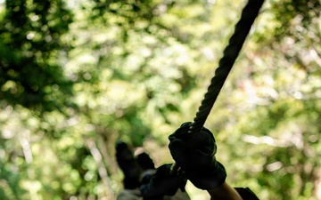 7th Communication Battalion Marines conduct jungle endurance obstacles at Jungle Warfare Training Center